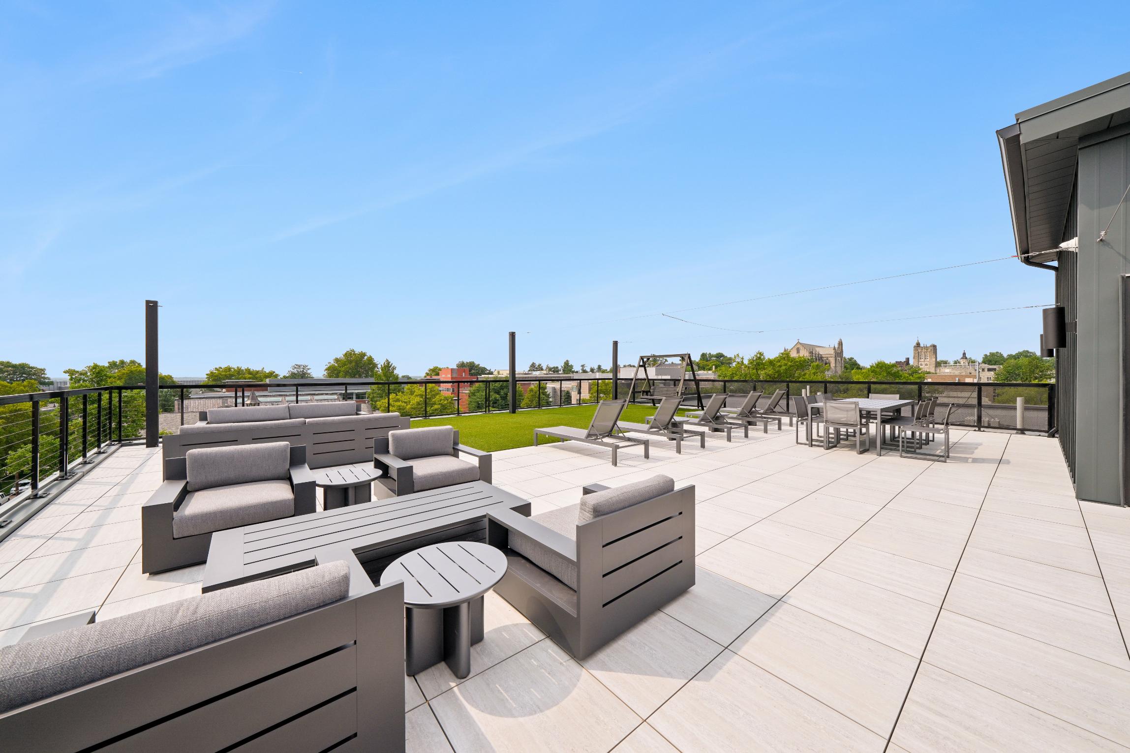 Rooftop deck with various community seating for entertainment